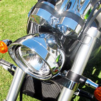 The Suzuki gets a stylized visor  and stretched shell.